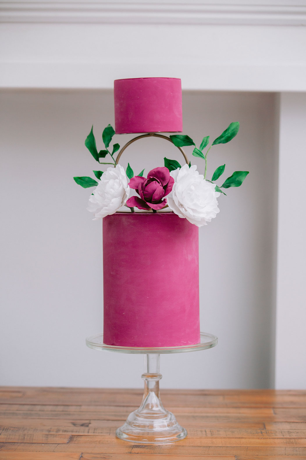 2 tier deep pink wedding cake with sugar flowers and gold hoop spacer | Louise Hayes Cake Design | Meghan Claire Photography