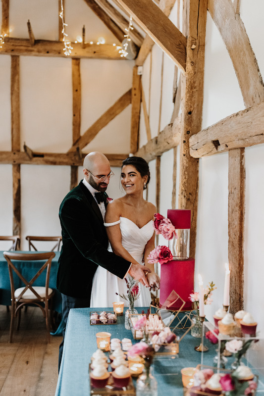 Cosy glam Surrey winter wedding | Contemporary wedding cake with dessert table | Melissa Megan Photography | Louise Hayes Cake Design