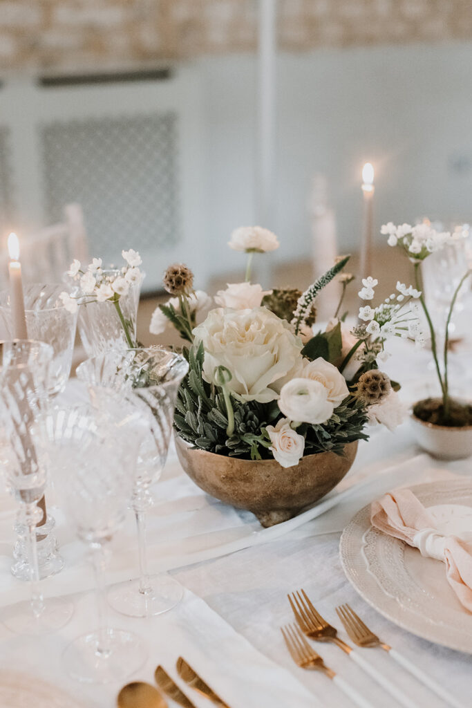 Spring inspired wedding tablescape with blush napkins, elegant stationery, floral arrangements, candles and blush draping fabric sails | Louise Hayes Cake Design | Melissa Megan Photography | Cowdray Wedding