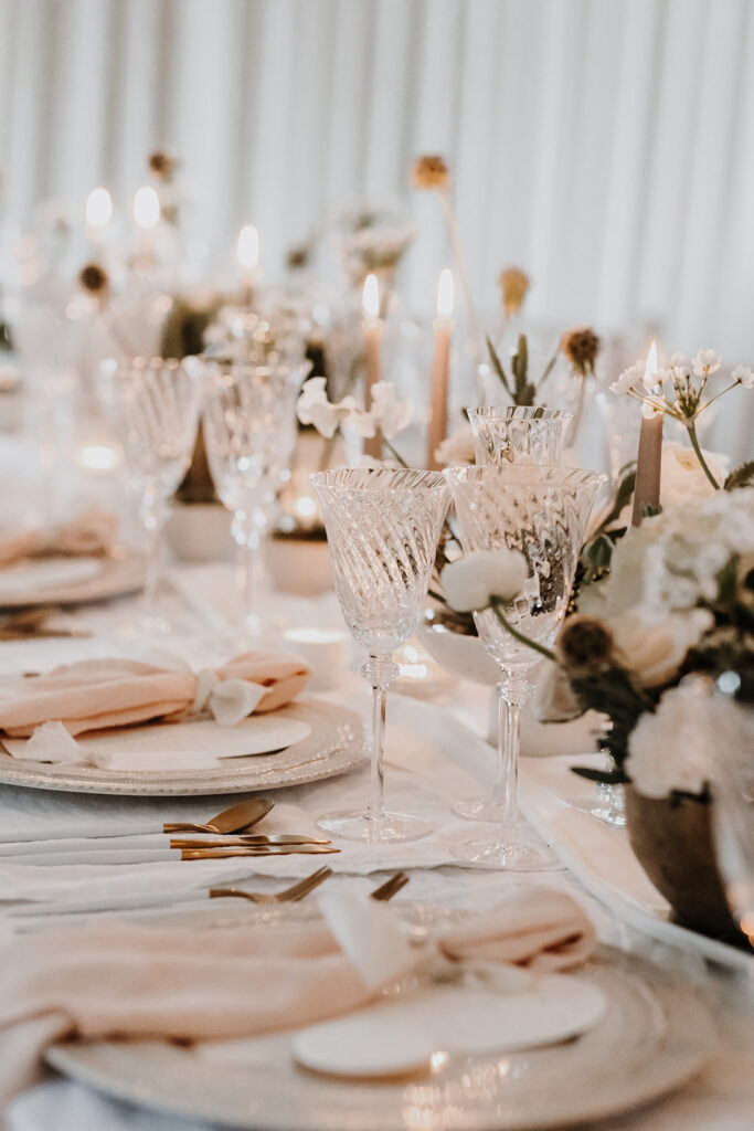 Spring inspired wedding tablescape with blush napkins, elegant stationery, floral arrangements, candles and blush draping fabric sails | Louise Hayes Cake Design | Melissa Megan Photography | Cowdray Wedding